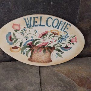 vintage hand stenciled welcome sign